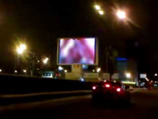 The indecent video clip on an outdoor screen in Moscow
